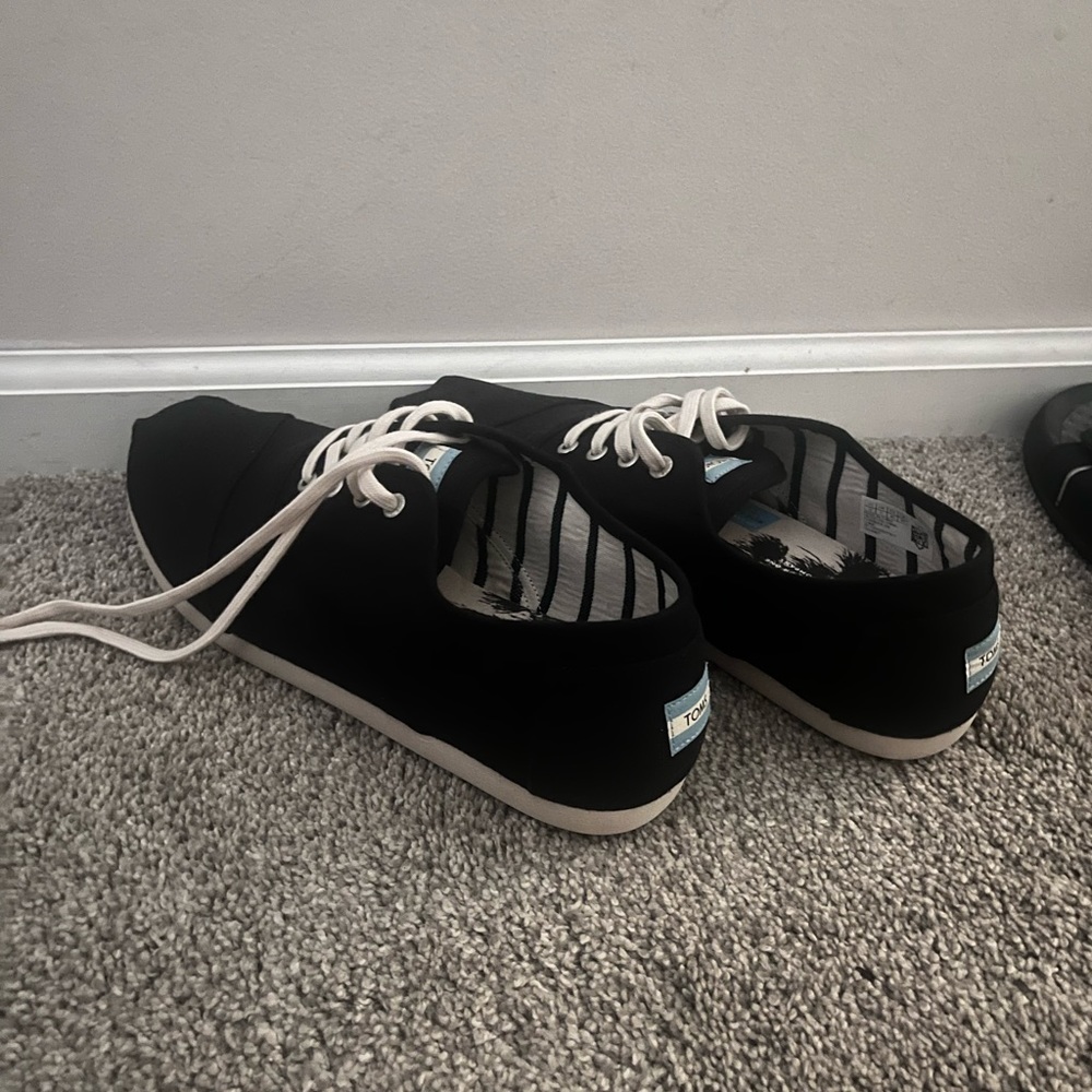 These TOMS are black size 12 men’s in great condition